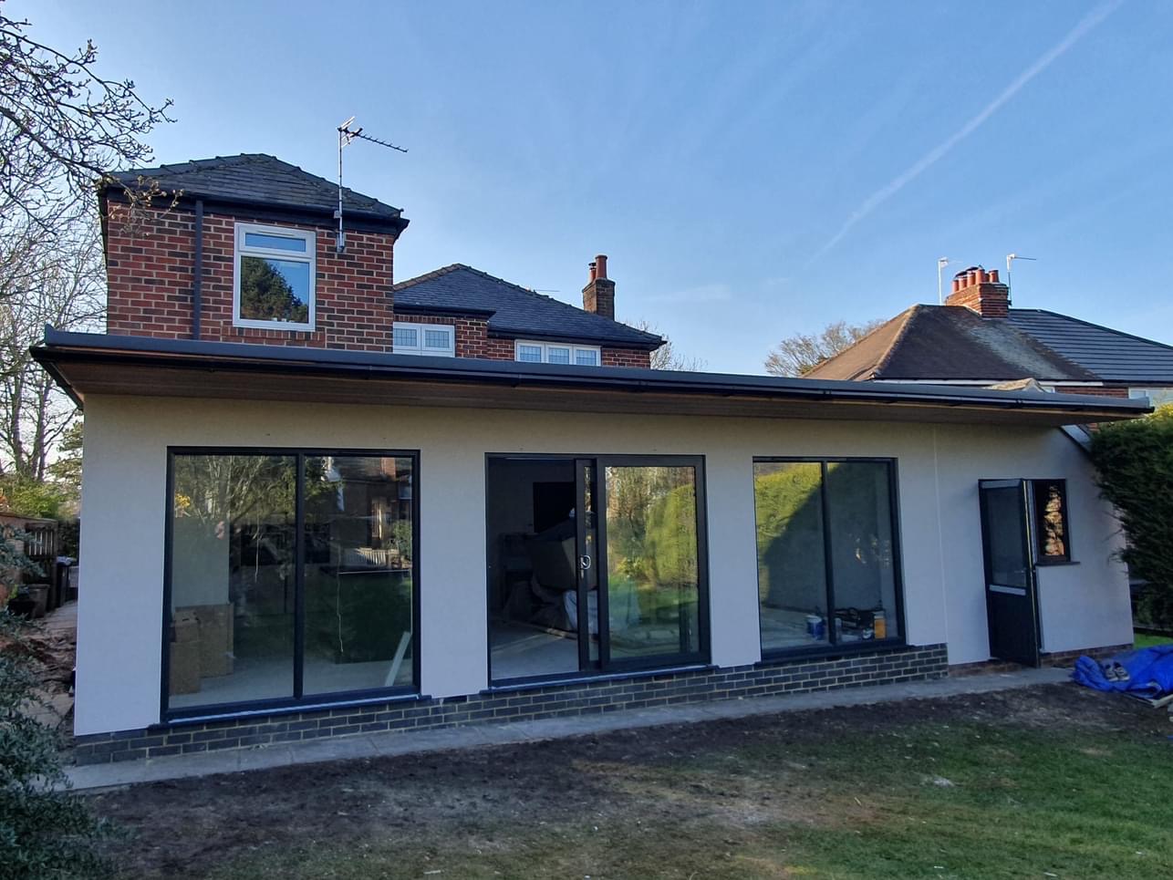 design a rear single storey extension to a house in Whitcliffe Drive, Ripon